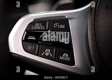 BMW X7 steering wheel controls with driver assistance and cruise cluster Stock Photo