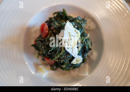 Boiled green horta salad with feta cheese Stock Photo