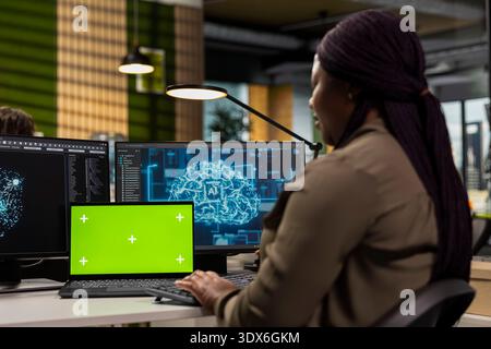 Isolated screen laptop used by software developer running AI algorithms in startup workspace. IT expert using artificial intelligence deep learning coding platform on mockup notebook Stock Photo