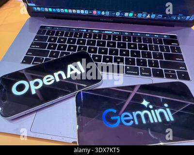 OpenAI and Google Gemini logos on digital screens. This editorial image illustrates the leading artificial intelligence platforms in the tech industry Stock Photo