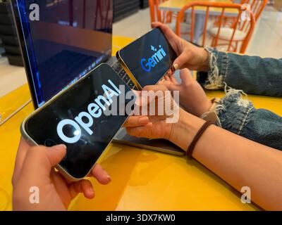 OpenAI and Google Gemini logos on digital screens. This editorial image illustrates the leading artificial intelligence platforms in the tech industry Stock Photo