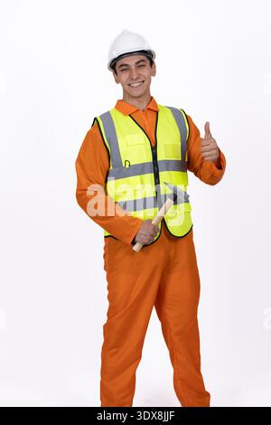 Worker in orange uniform with safety vest Stock Photo