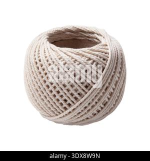 White cotton string twine macrame rolled on a reel spool. Rope cord for wrapping, DIY, gardening, crafts Stock Photo