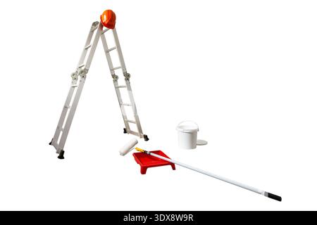 Several painting tools and latex paint on a construction site prepared for painting Stock Photo
