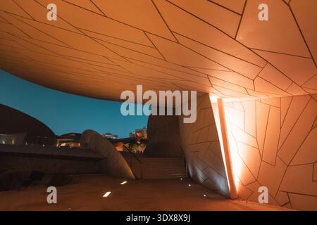 30 November 2025, Doha, Qatar: striking entrance and modern design of the National Museum of Qatar Stock Photo