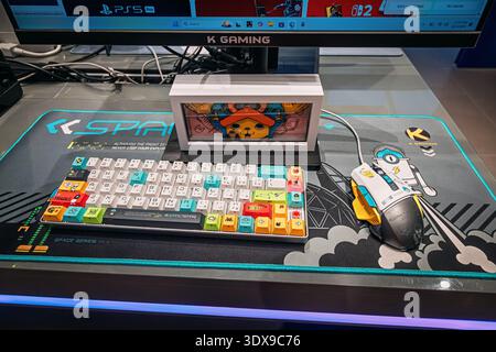 2 December 2025, Bahrain, Manama: Gaming desktop setup featuring a custom keyboard, mouse, displaying technology and entertainment Stock Photo