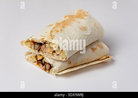Shawarma kebab with meat and french fries on a white background isolated Stock Photo