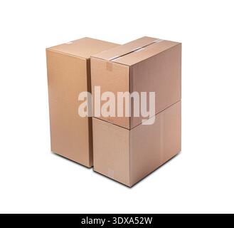 Three brown corrugated cardboard boxes of different sizes are stacked together against a white background. Stock Photo