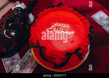 Tasty sponge cake with fresh berries and mint on light gray table, closeup Stock Photo
