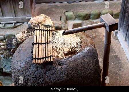 View of traditional Japanese bamboo water fountain Stock Photo