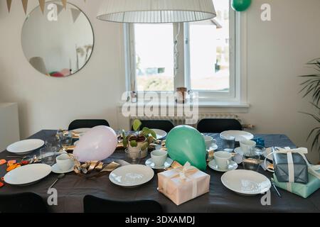 View of birthday party table set up at home Stock Photo