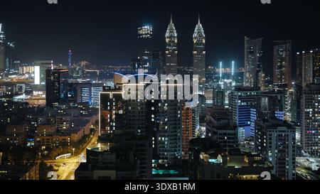 Aerial view of the illuminated modern business district featuring ...