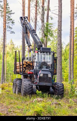 Forwarder a forestry vehicle in a forest Stock Photo