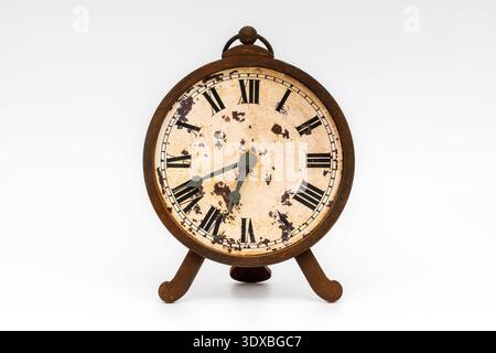 Vintage Clock with Roman Numerals on White Background Stock Photo