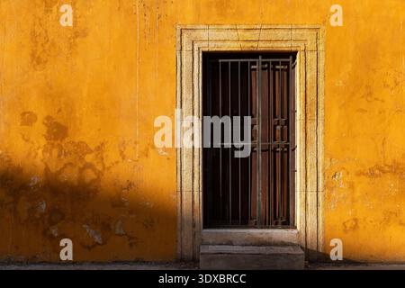 Yellow Mexican colonial facade, Izamal, Yucatan, Mexico. Stock Photo