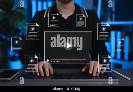 Digital content marketing concept with person hands typing on keyboard and virtual video player interface. High quality multimedia streaming, online Stock Photo