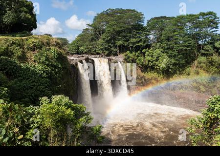 Rainbow Falls is located within the Wailuku River State Park, which is a popular visitor destination, which is near Hilo, on the Big Island of Hawaii. Stock Photo