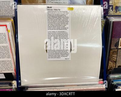 Manchester, UK - February 22, 2026: White vinyl sleeve of Mudd Mahalo Mata Ne Balearic 12 inch LP on sale in a record shop. Stock Photo