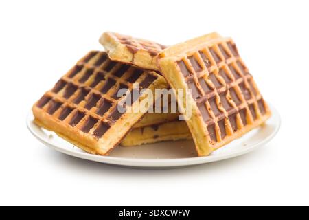 Sweet waffles with chocolate isolated on a white background. Stock Photo