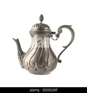 Old grunge craft tin coffee pot isolated on white background. Antique pewter coffee pot. Stock Photo