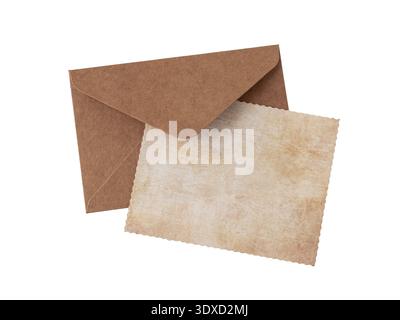 Blank grunge paper card and brown retro envelope isolated on white background Stock Photo