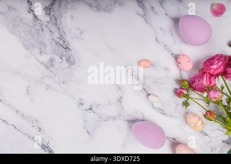 Easter Composition with Decorative Eggs and Pink Flowers Stock Photo