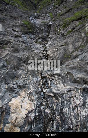 Rocky Landscape In Luzzone, Switzerland With Layered Textures. Stock Photo