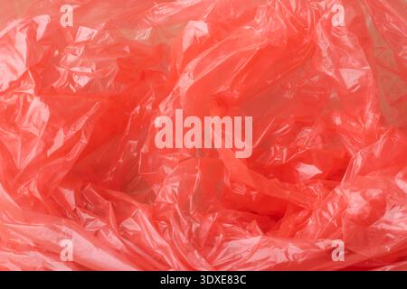 Crumpled blue plastic creating an abstract texture background Stock Photo