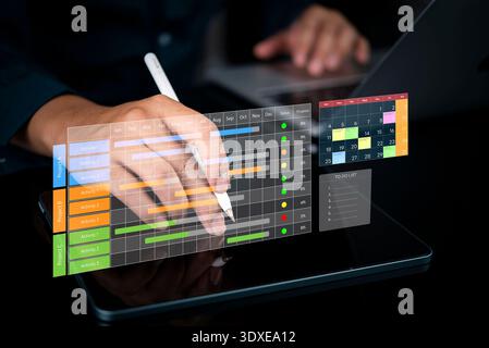 Strategy and planning for project management on digital tablet screen. business timeline, schedule, progress data, ensuring corporate efficiency. Adva Stock Photo