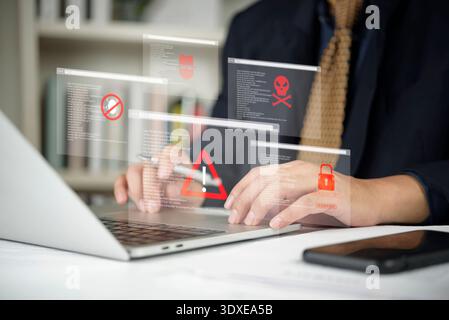 Cybersecurity threat, hacker attack concept. Businessman using laptop, system alert, data breach warning. Virtual interface show malware, virus, passw Stock Photo