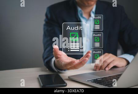 Businessman presenting digital audit checklist interface checkmark document compliance verification report quality control management system approval Stock Photo