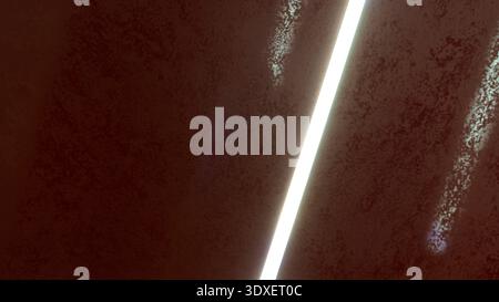 Abstract dark brown textured wall with bright diagonal light beam. Minimalist architectural detail with sharp light stripe on grainy surface. High quality photo Stock Photo