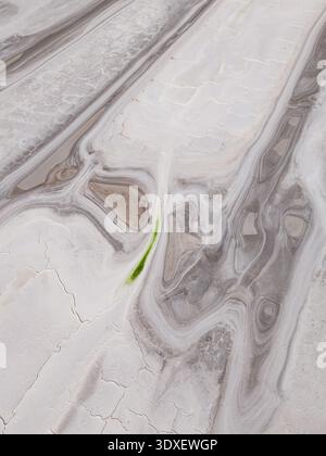 Aerial view of swirling patterns and contrasting textures create an otherworldly landscape at the Old Chandler Potash Mine Site, Western Australia, Au Stock Photo