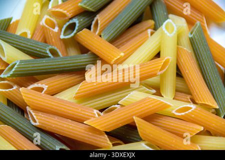 Tri color pasta noddles close up. Stock Photo
