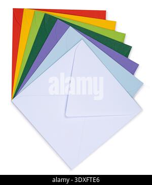 Stack of vibrant colorful envelopes presenting a spectrum of colors on white background. Top view, isolated on a white background. Stock Photo