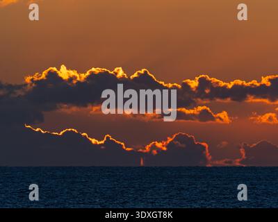 Sunset lit clouds over the English Channel from Portland Bill, Jurrasic Coast, Dorset, England, UK, January 2023 Stock Photo