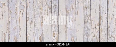 Bright wooden wall - panoramic background with peeling white paint Stock Photo