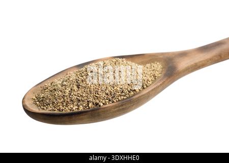 Black pepper ground on wooden spoon, isolated on white background. Stock Photo