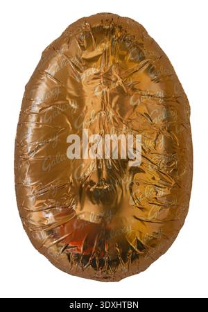 Galaxy Easter egg foil wrapped isolated on white background Stock Photo