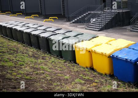 Lots of colorful plastic garbage containers Stock Photo