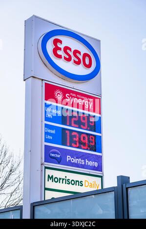 Esso petrol station sign displaying fuel prices, Main Road, Fairlie, Ayrshire, Scotland, UK Stock Photo