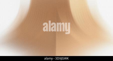 Abstract blurred image featuring two contrasting light brown tones with a soft and smooth transition Stock Photo
