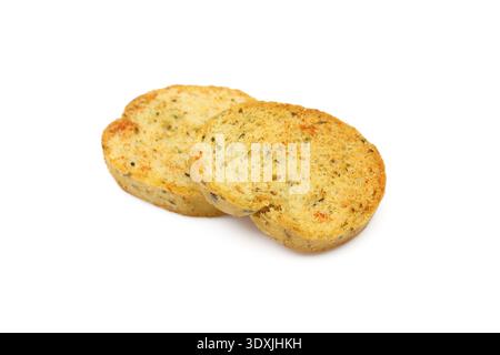 Two pieces of bruschetta snack isolated on white background. Toasted bread with herbs Stock Photo