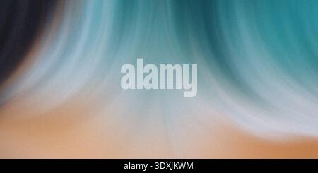 Abstract blurred gradient of colors blending from teal to tan with dark shadow on the side view Stock Photo