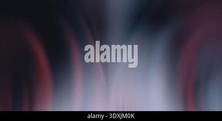 Abstract blurred background showing dark and light shades of purple and pink in a vertical gradient Stock Photo