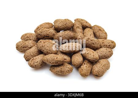 Pile of chocolate pillows isolated on white background. Dry crispy dessert Stock Photo