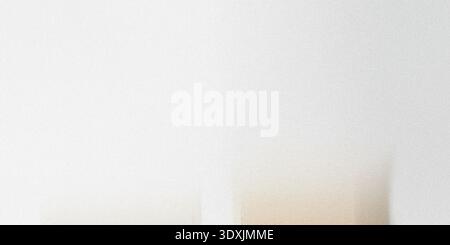 A blurry abstract image featuring a gradient of white and light beige colors with subtle hints of green Stock Photo