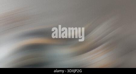 A blurry abstract image showing a mix of white gray and some green tones in a soft diffused manner Stock Photo