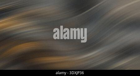 Abstract blurred background with shades of gray and brown creating a textured and soft effect Stock Photo