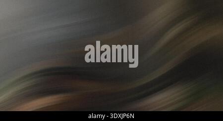 Abstract blurry background featuring shades of brown gray and hints of yellow and green colorations Stock Photo